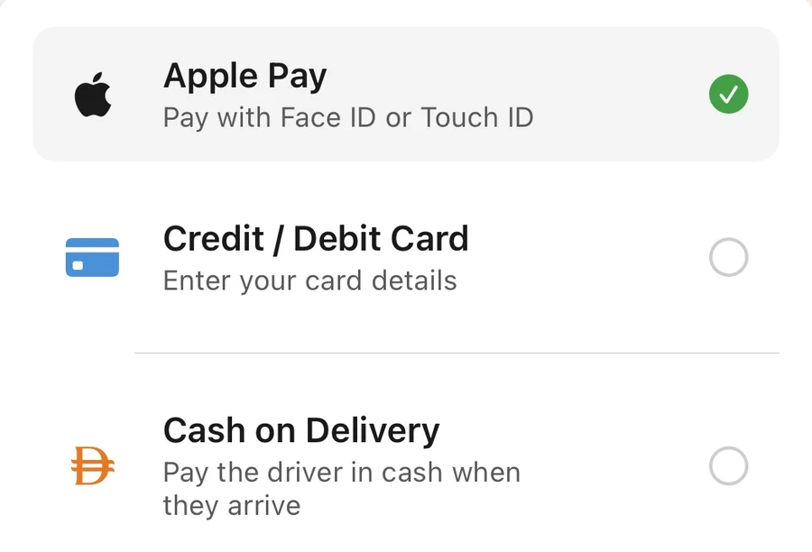Payment options on a checkout screen: Apple Pay, credit or debit card, and cash on delivery